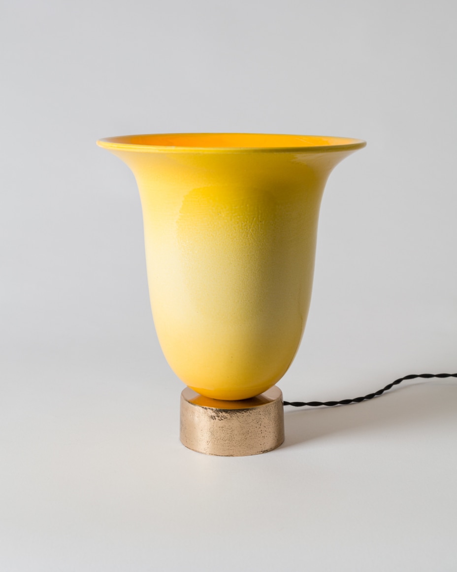 ceramic yellow lamp in a gray room