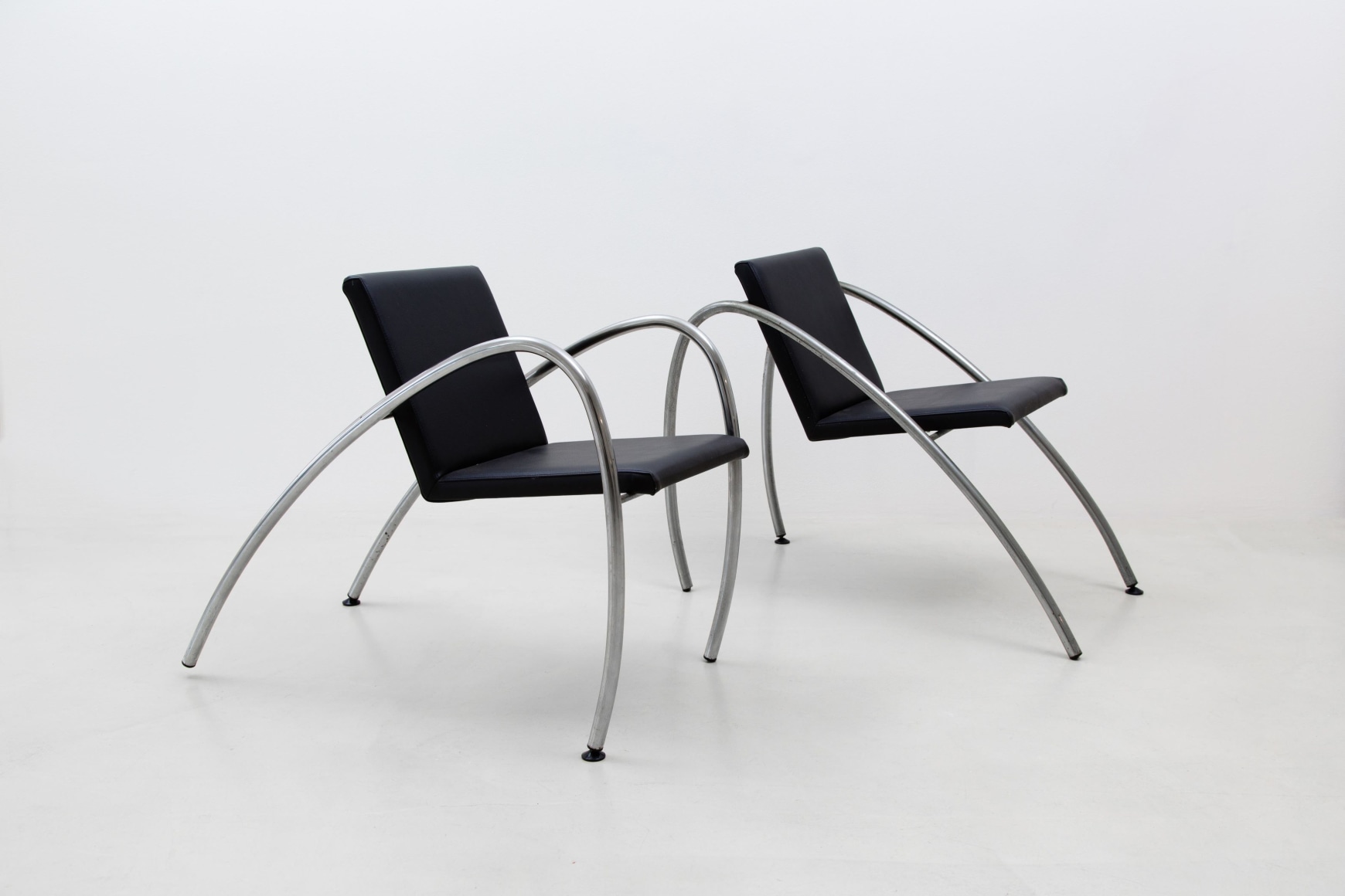 Black chairs with a white background