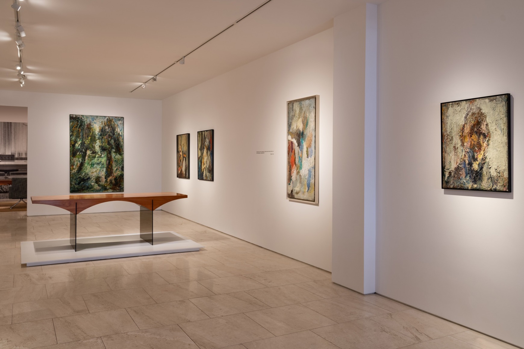 Installation view of the exhibition Dunkirk-Roubaix, Leroy works on wall from left to right:  Deux Arbres, 1962, L'Âtre, 1954, Untitled (Maternity), c. 1959, Neiges, 1957, and Autoportrait, c. 1960.