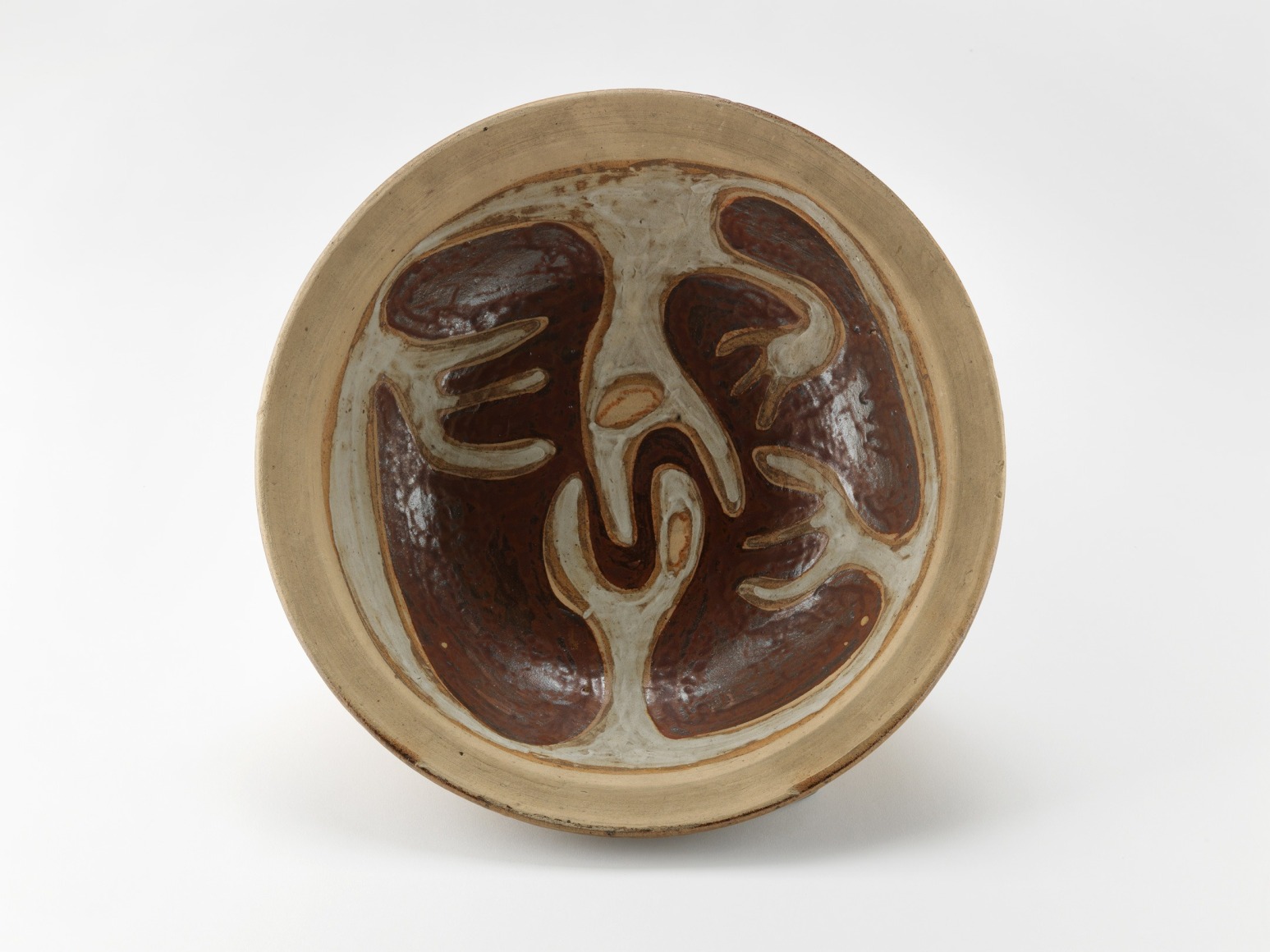 photograph of a dish in an empty room