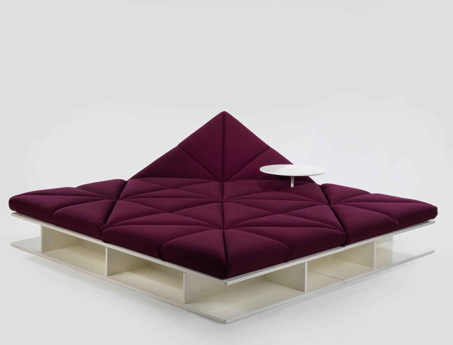 Upholstered modular sofa with removable base and table by Pierre Paulin