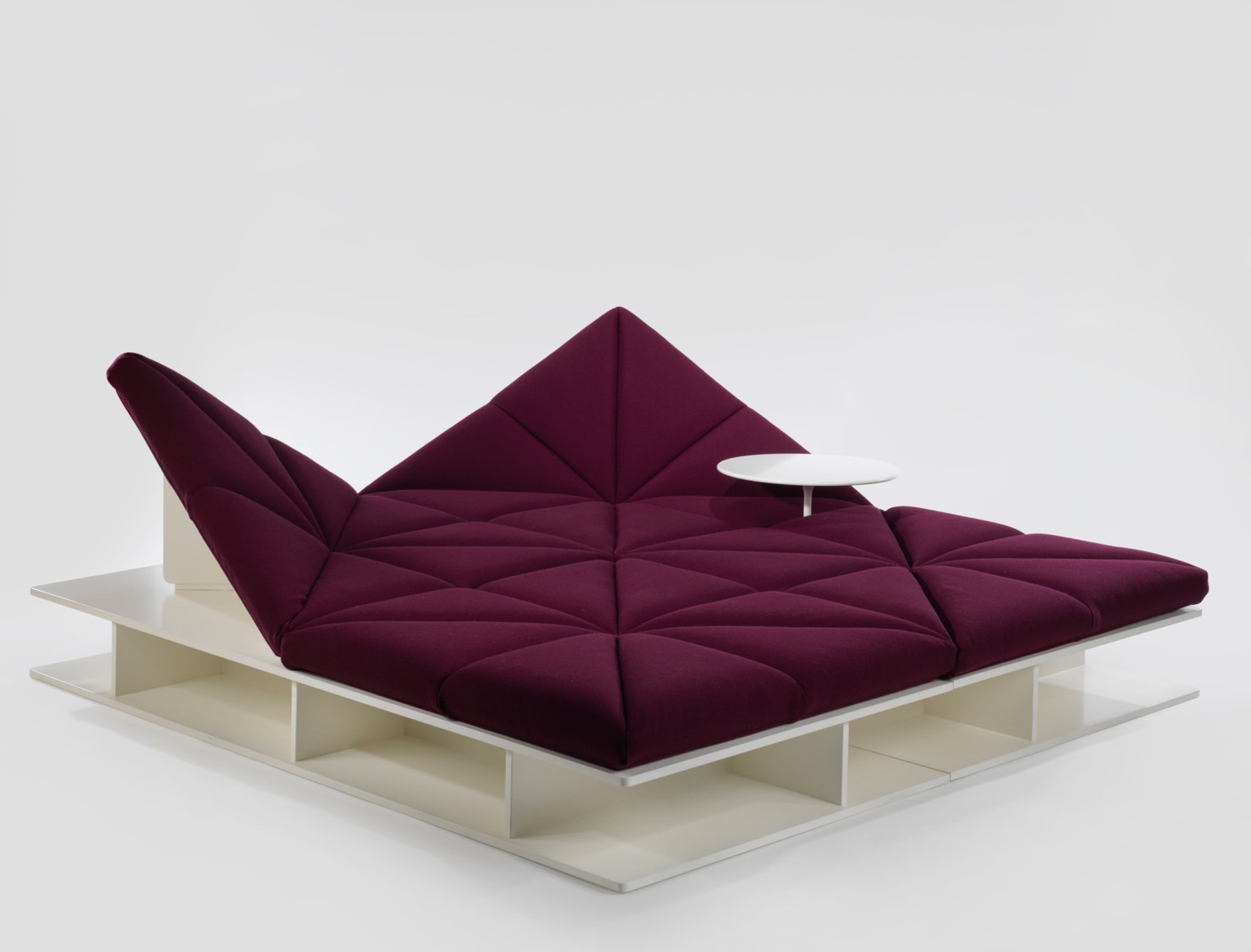 Upholstered modular sofa with removable base and table by Pierre Paulin
