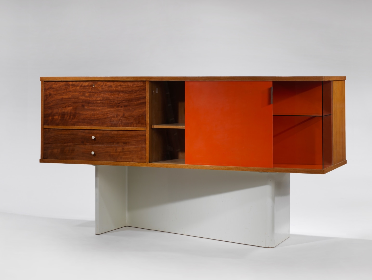 Jacques Dumond Secretary made of wood and hardware photographed with compartments opened and shut.