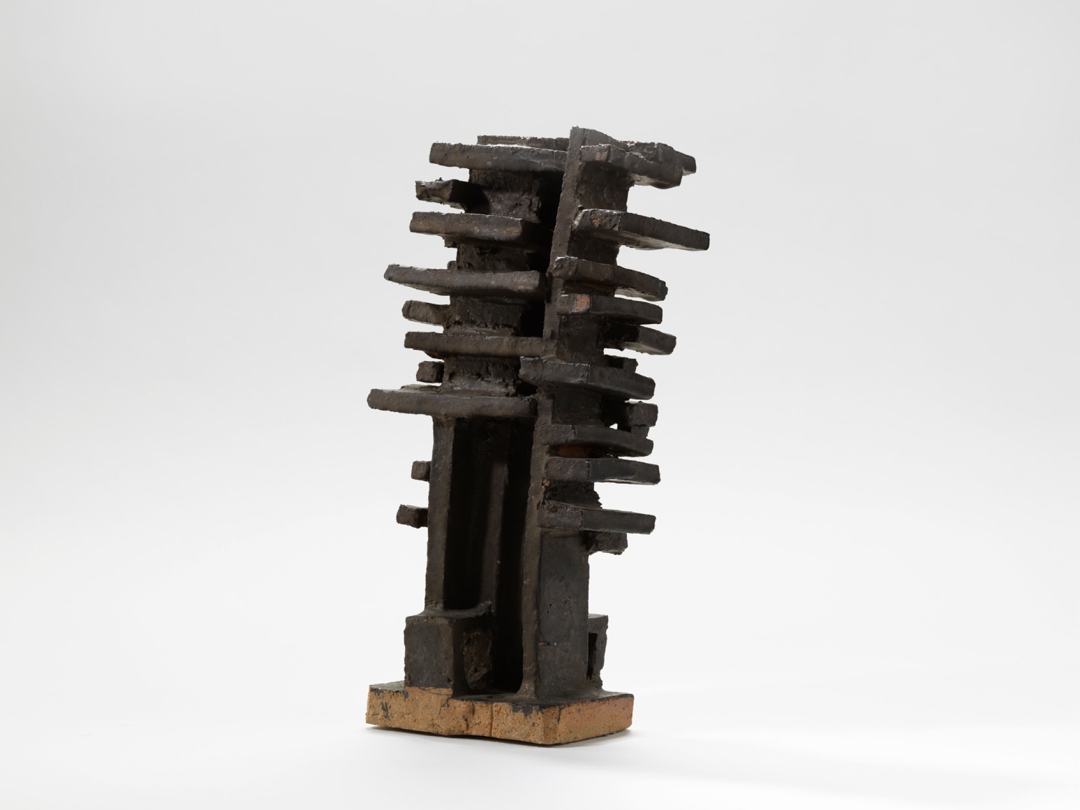 photograph of a geometric sculpture in an empty room