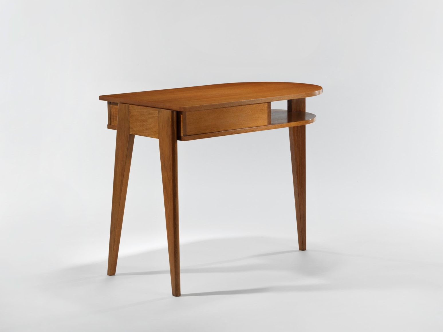 wood desk in an empty room