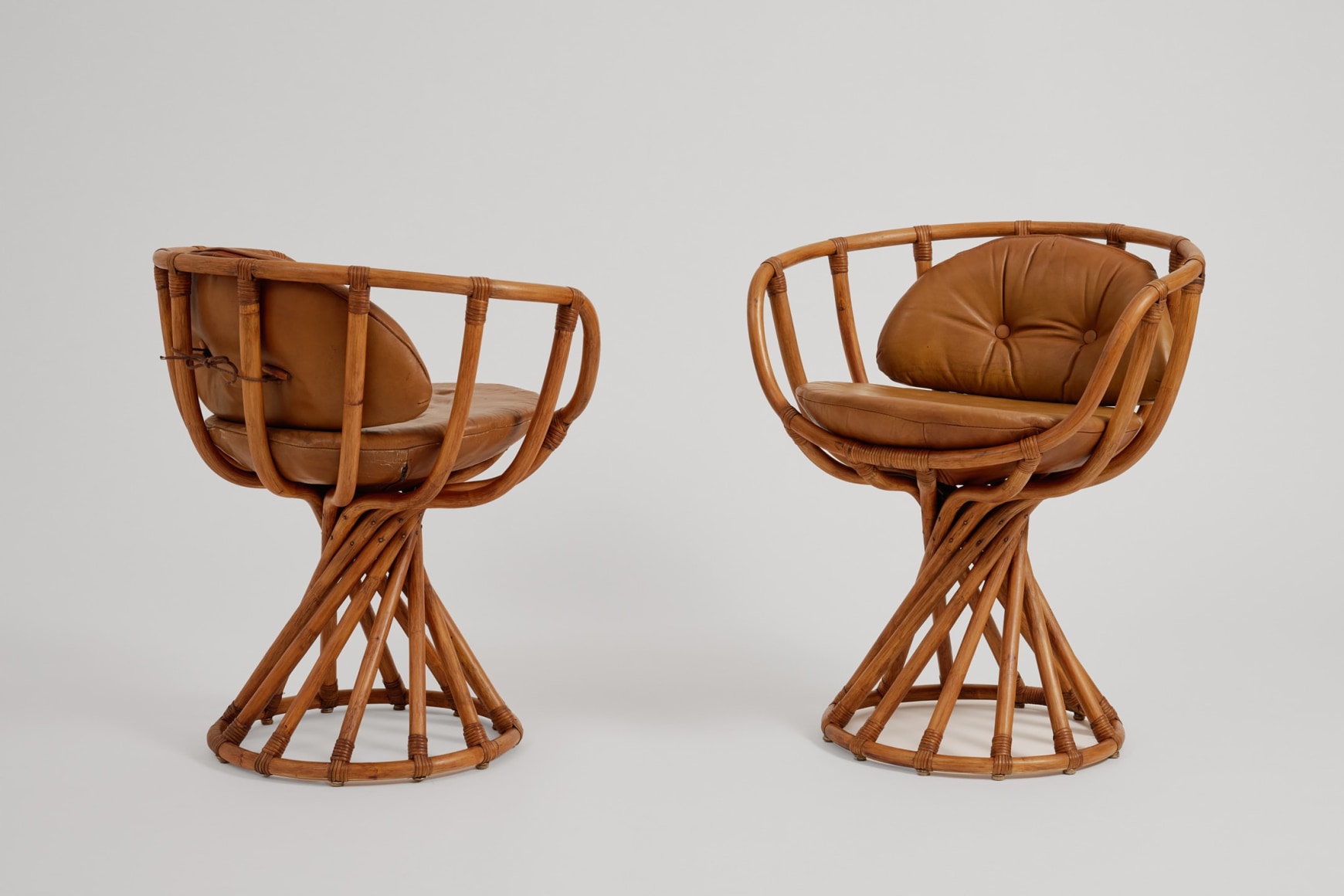rattan chairs in an empty room