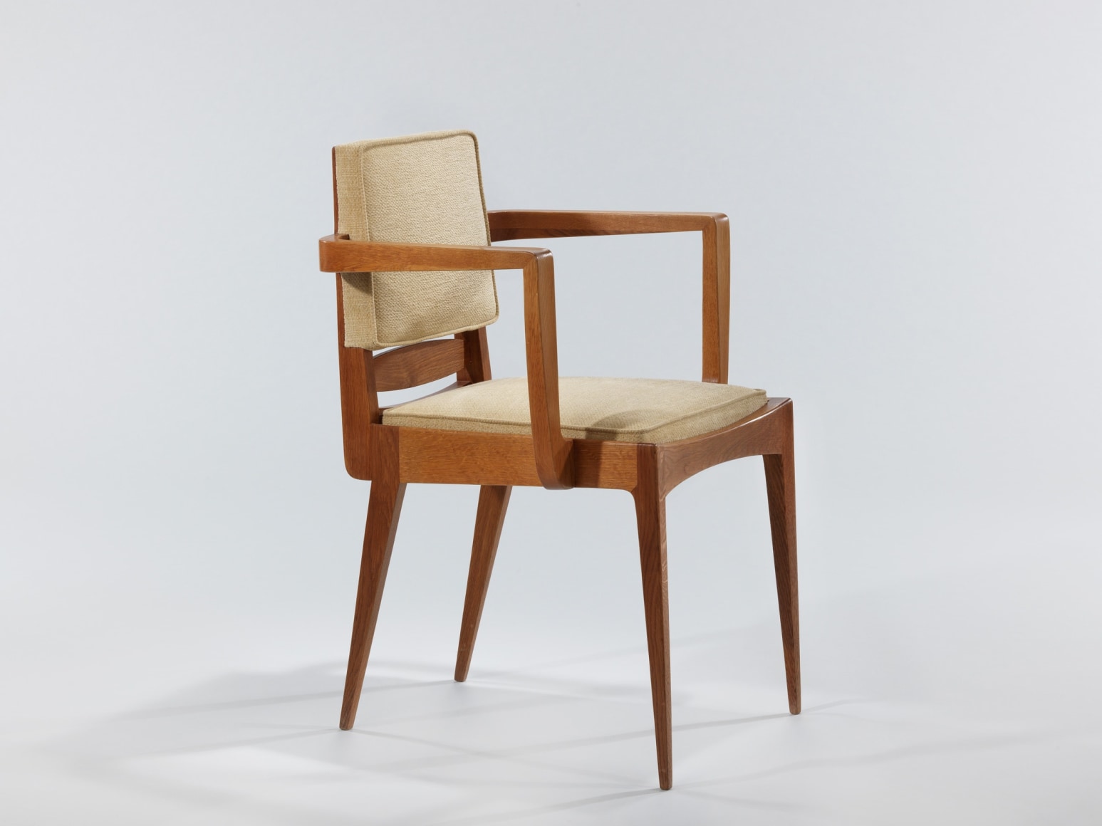 photograph of a chair in an empty room