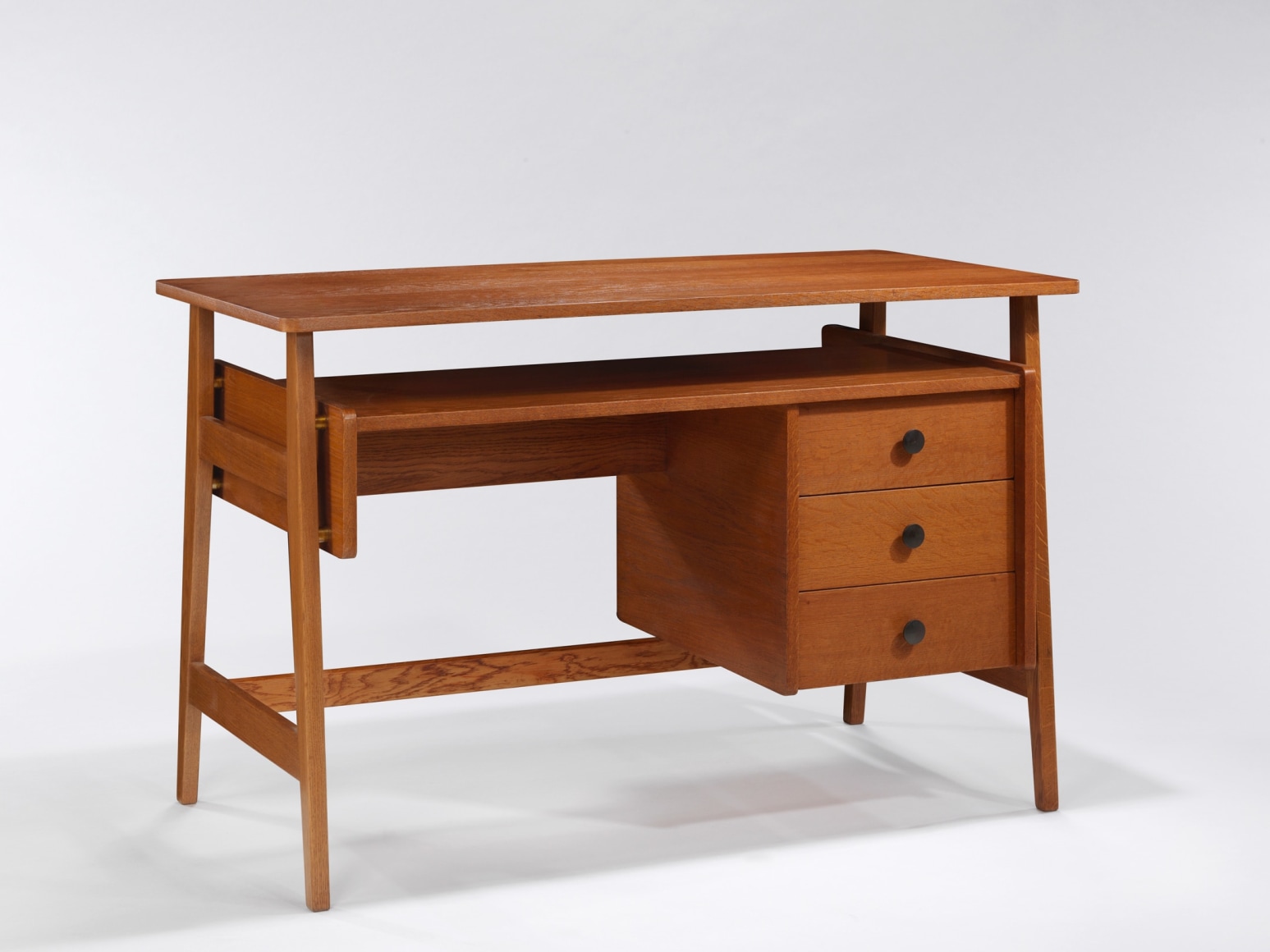 Image of desk in wood with drawers by Rene Jean Caillette.