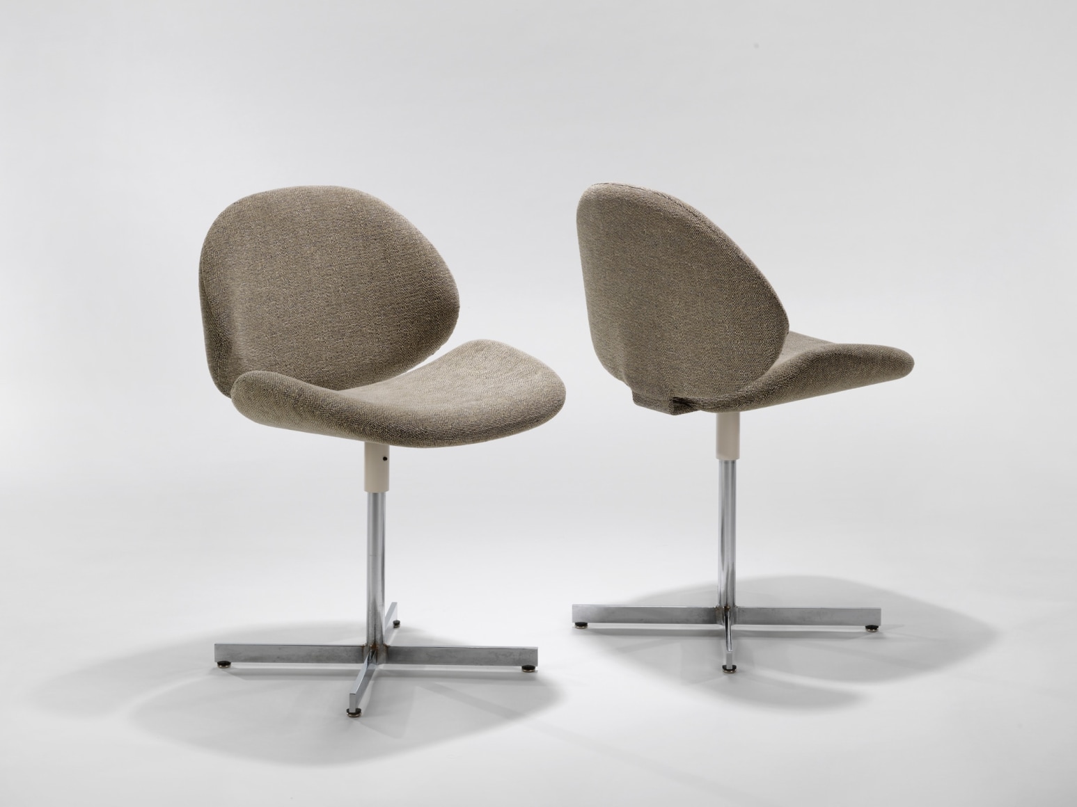 photograph of 2 chairs by Fermigier in a blank room