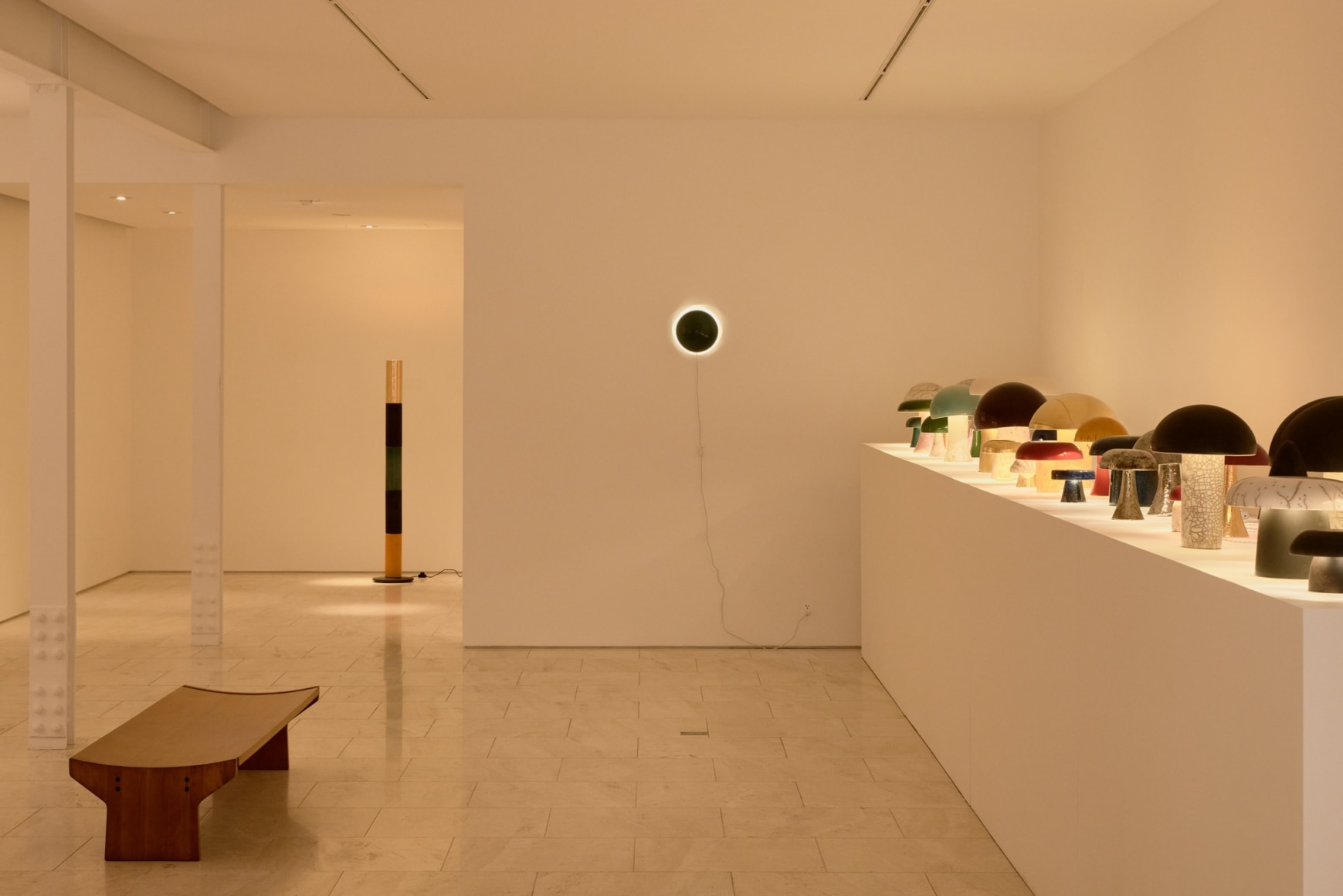 Gallery view of various height lamps and wall sconce by Jos Devriendt