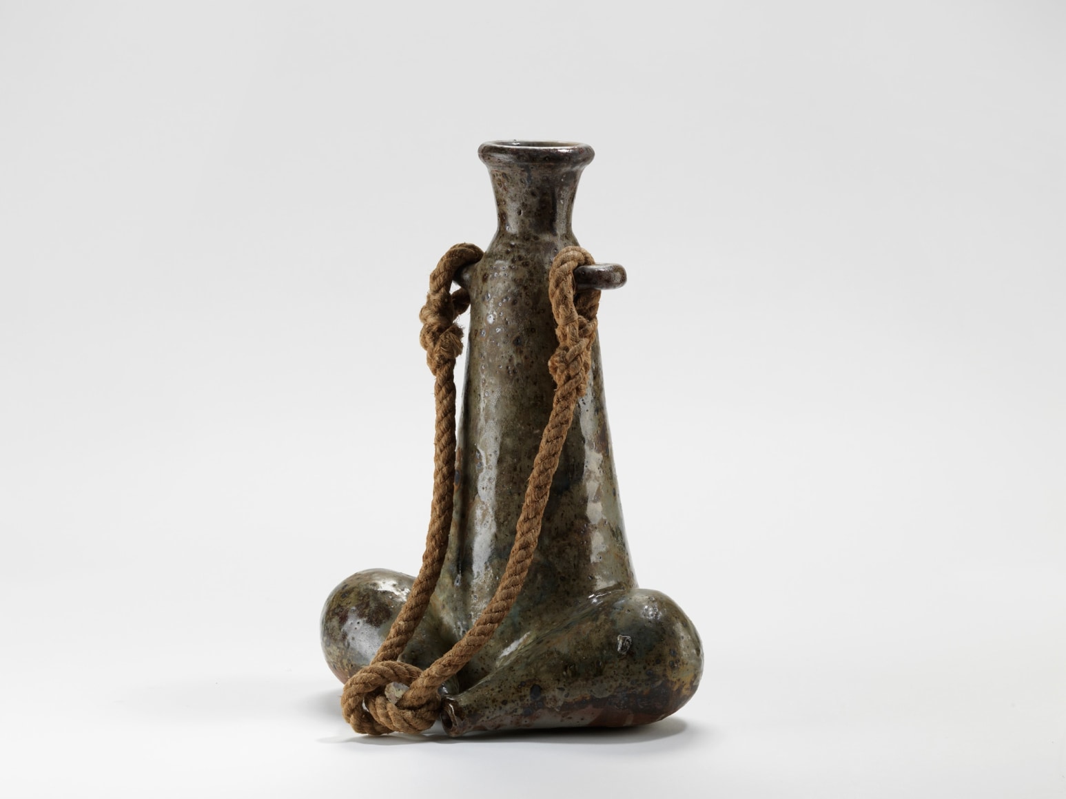 photo of anthropomorphic sculpture in a blank room