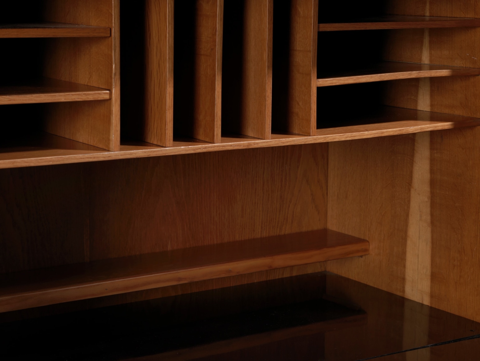 Detail of storage space in locked wooden cabinet
