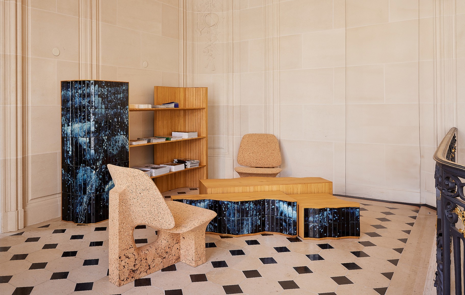 photograph of bookshelf and chairs in a room