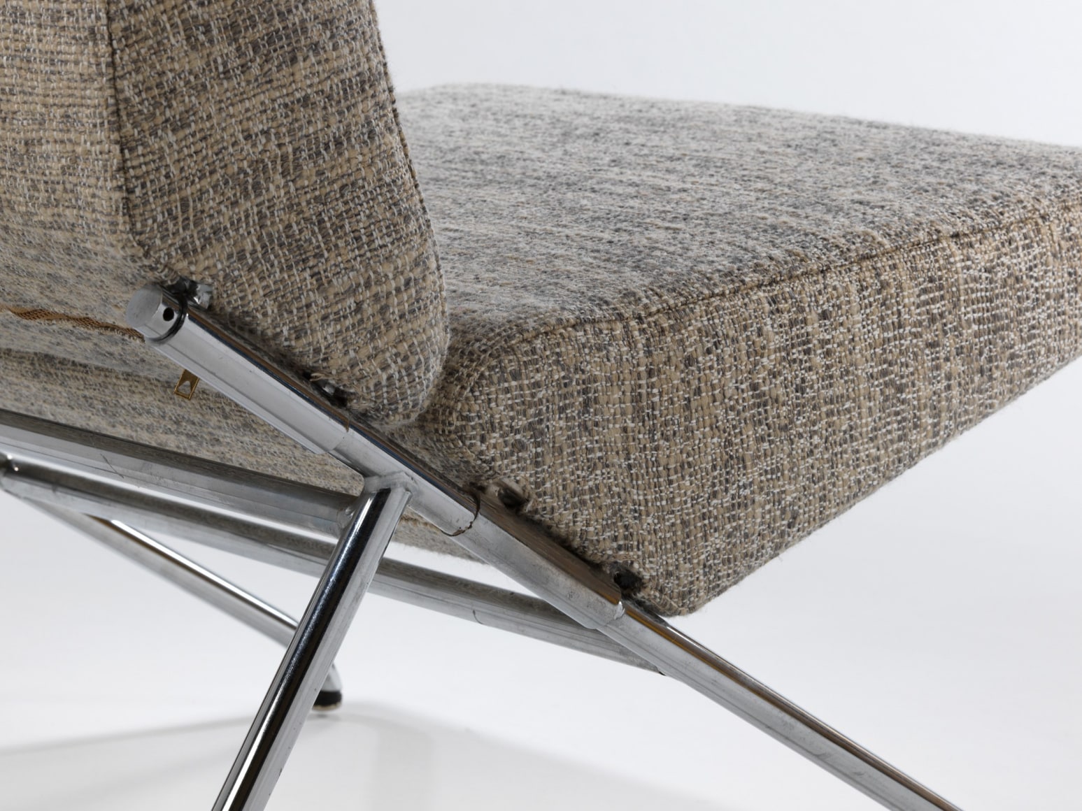 Detail of the steel base and upholstered seat