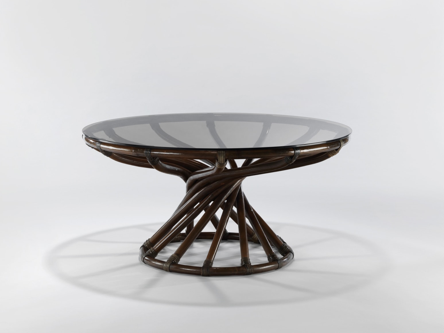 Glass topped rattan low table by Bernard Govin