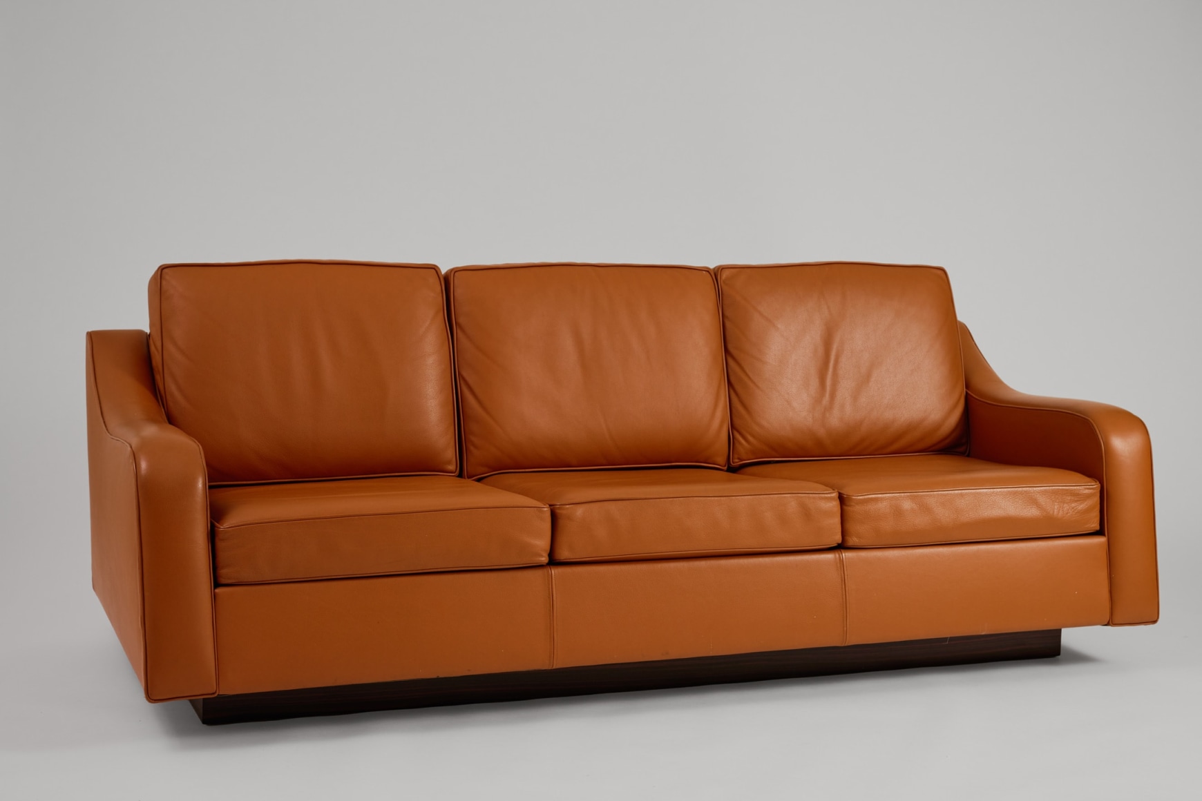 leather sofa in an empty room