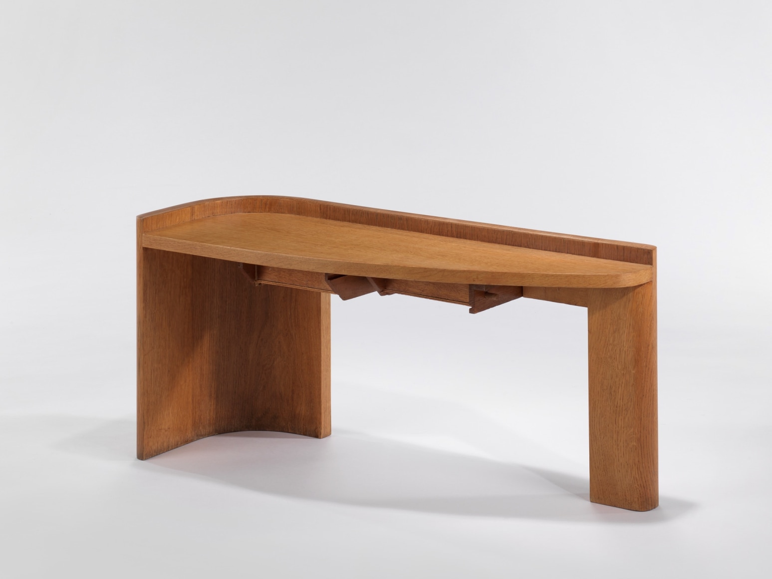 Wooden table in front of white background