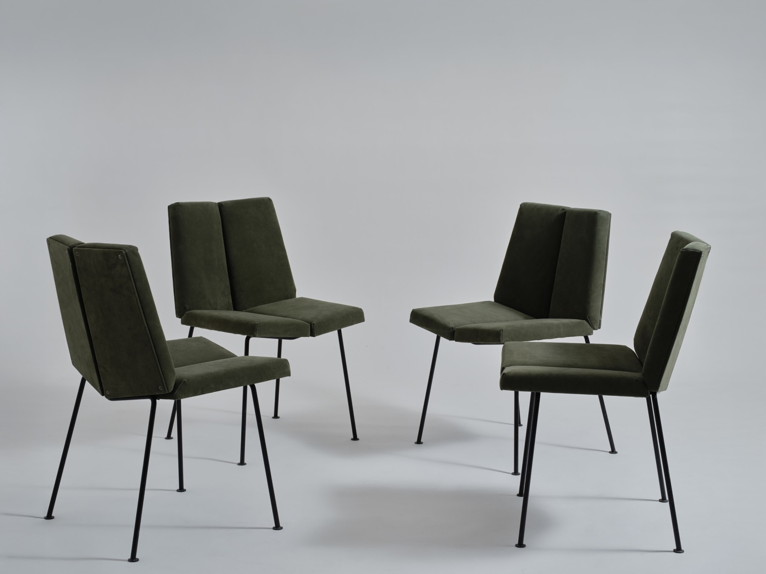 set of chairs in an empty room