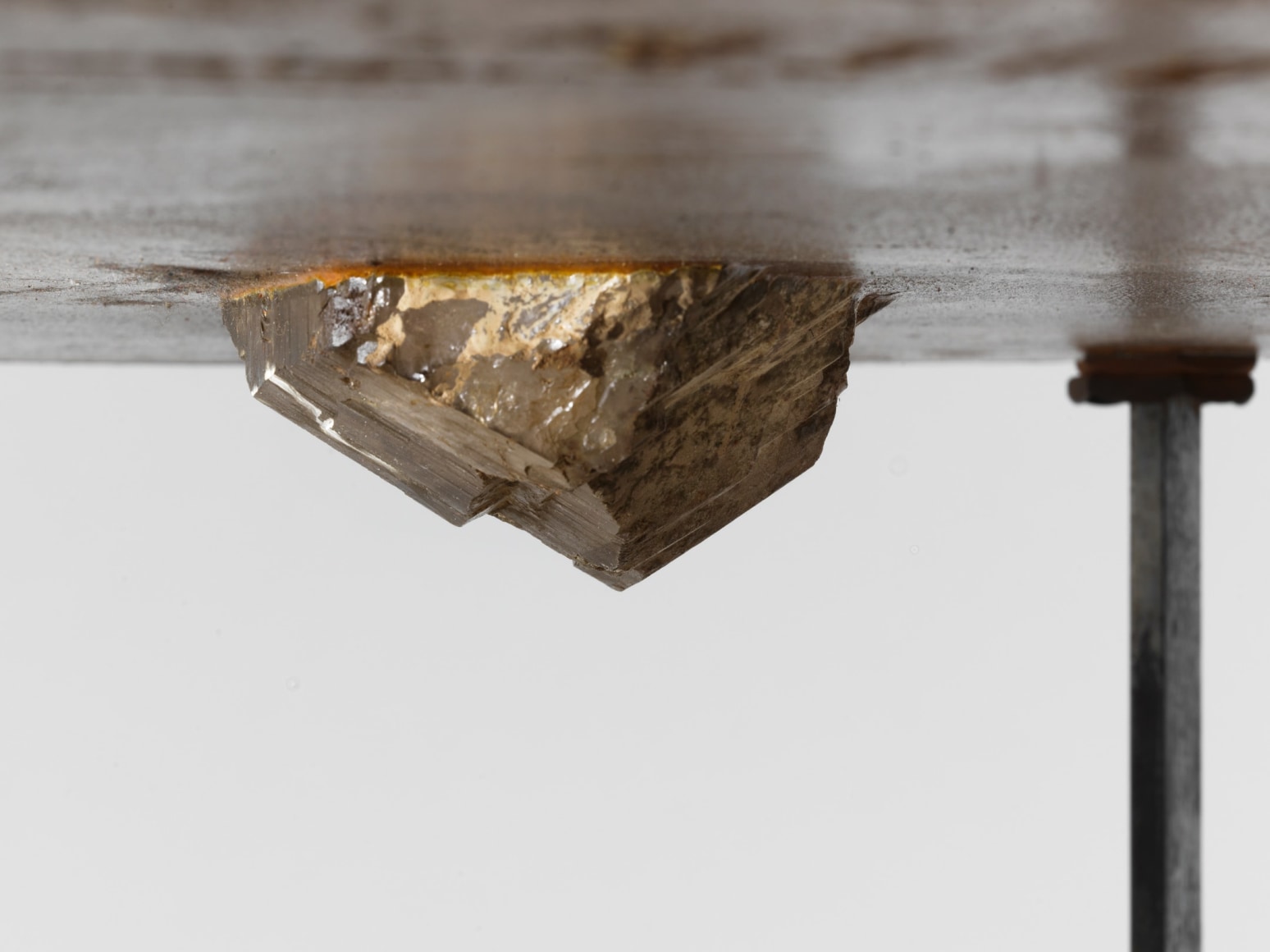 bottom of metal table with stone