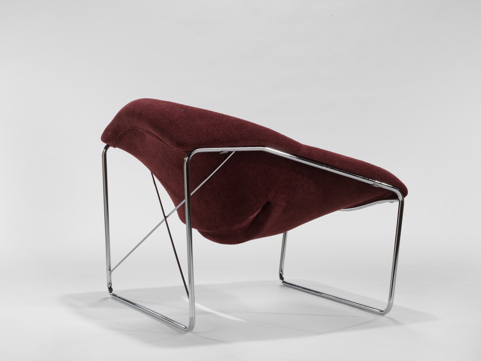 purple chair in a white room