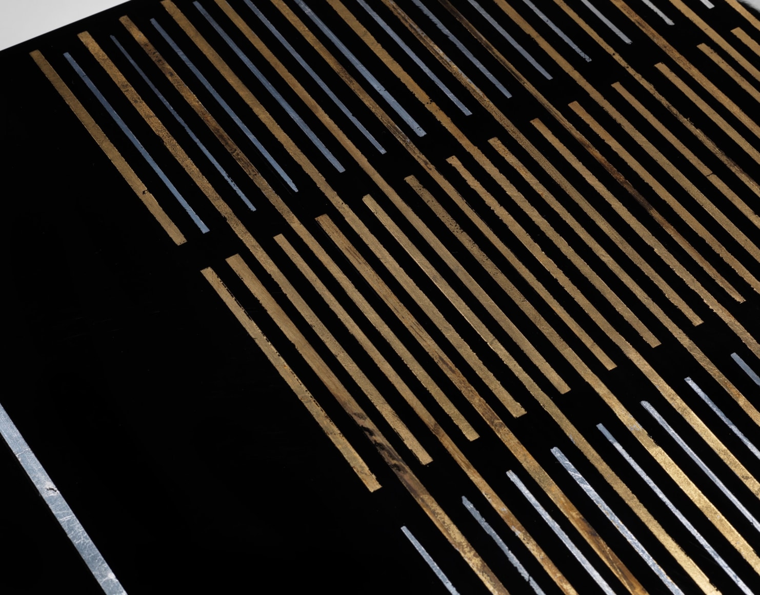 photograph of a black table in a blank room