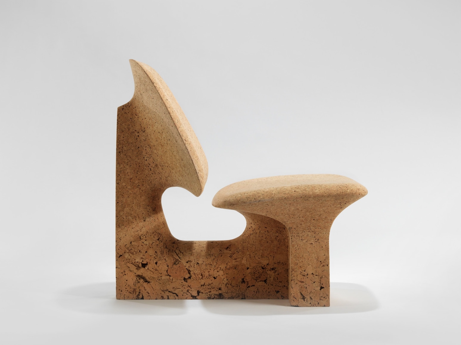 Burnt cork lounge chair in cork by made in situ.