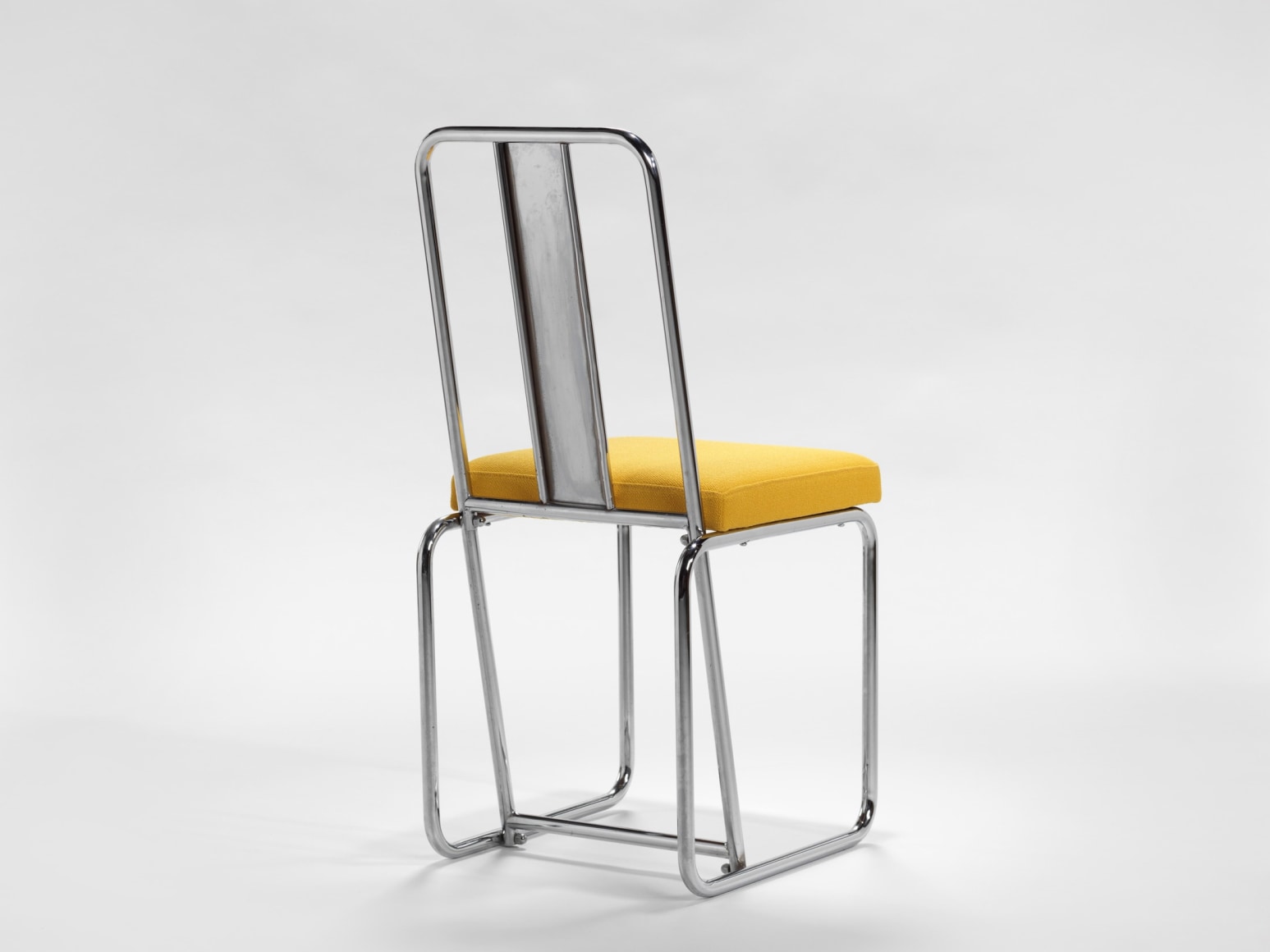 yellow chairs in an empty room