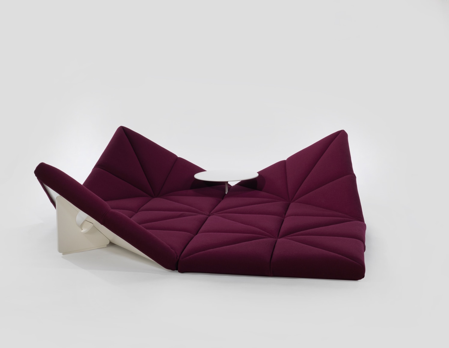 Upholstered modular sofa with table and without base by Pierre Paulin