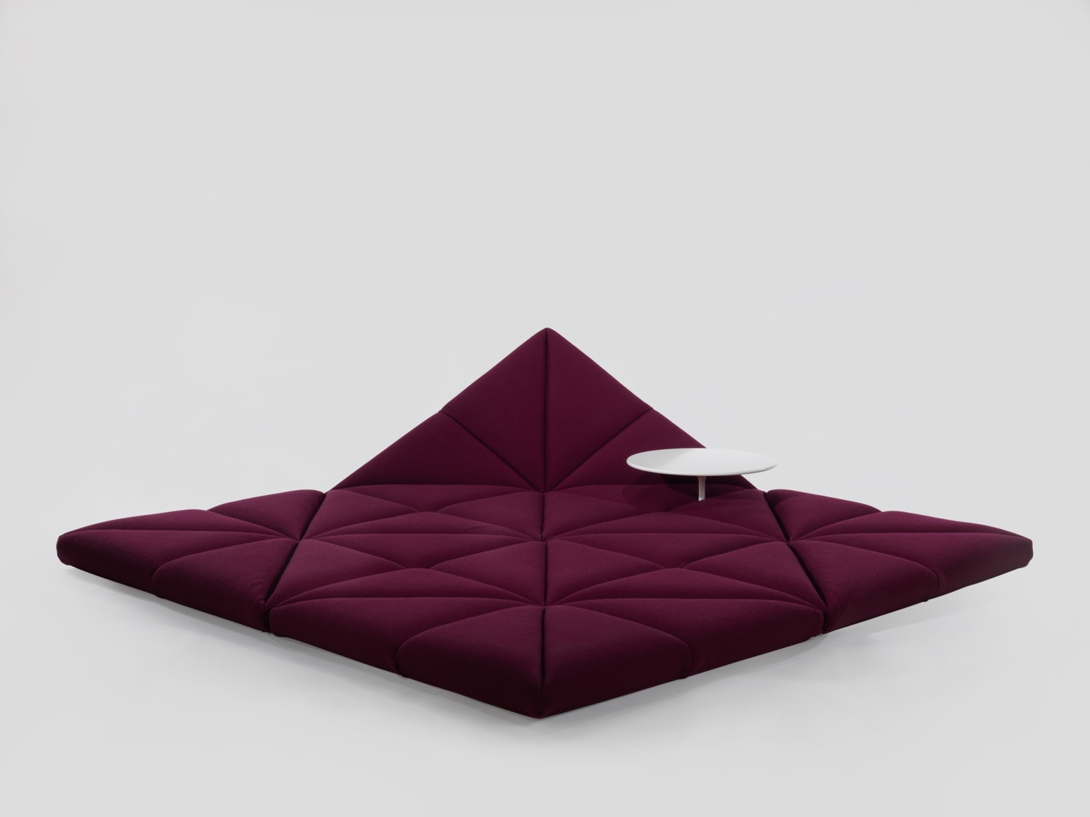 Upholstered modular sofa with table and without base by Pierre Paulin