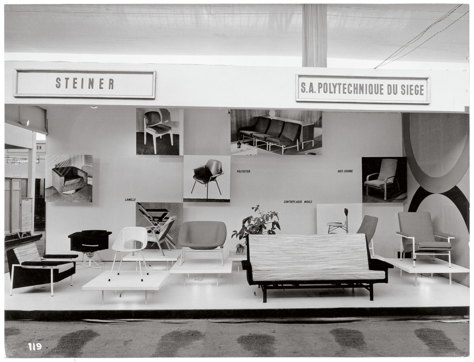 Archival image from Steiner Booth at Foire de Paris. 1956, Paris. Armchair shown on left.
