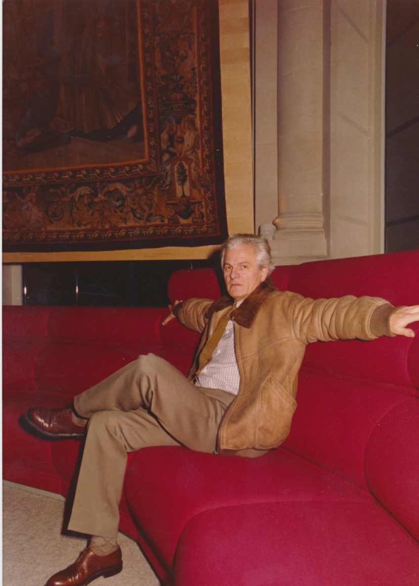 Archival image of Chirac sofa in the room. Paulin sitting on top of it.