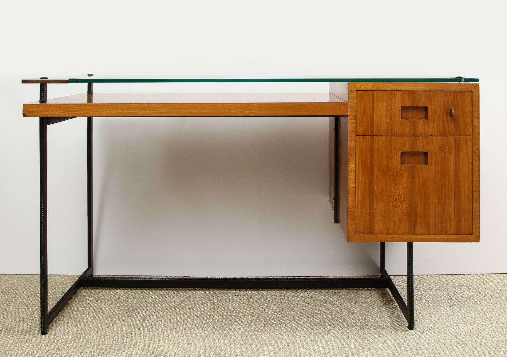 Fruitwood desk with glass top by Adnet - Collections - Eric Appel