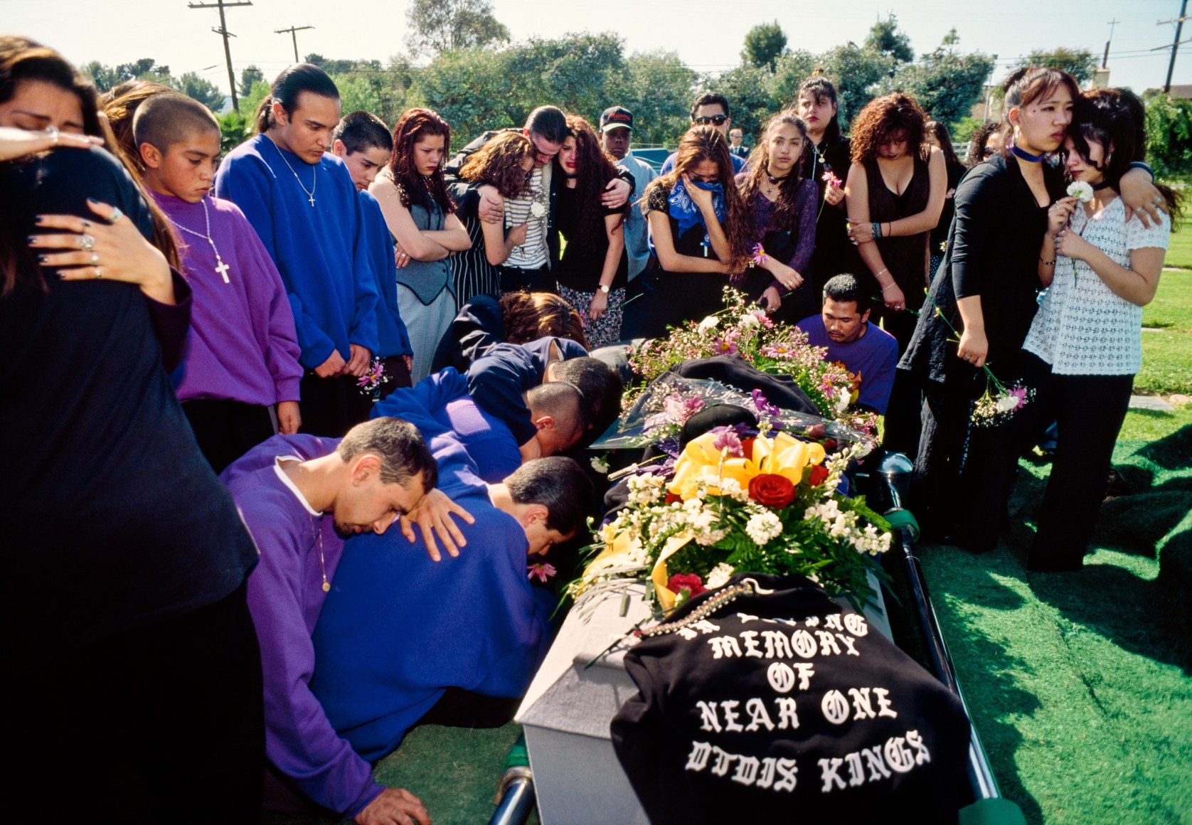 The funeral of an eighteen- year-old tagger who was shot and killed by a rival gang in Rancho Palos Verdes, an affluent suburb of Los Angeles, 1993, Archival Pigment Print