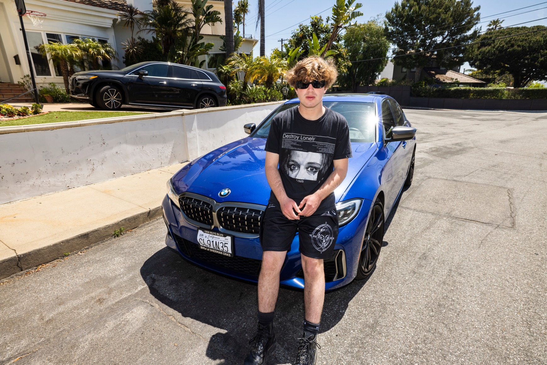 Jack's New Car, Jack Schwartz, 18, with his new BMW, Playa del Rey. Jack funded the purchase by throwing parties for his peers, creating his own fashion brand, and signing a deal with Snapchat for his content, 2023