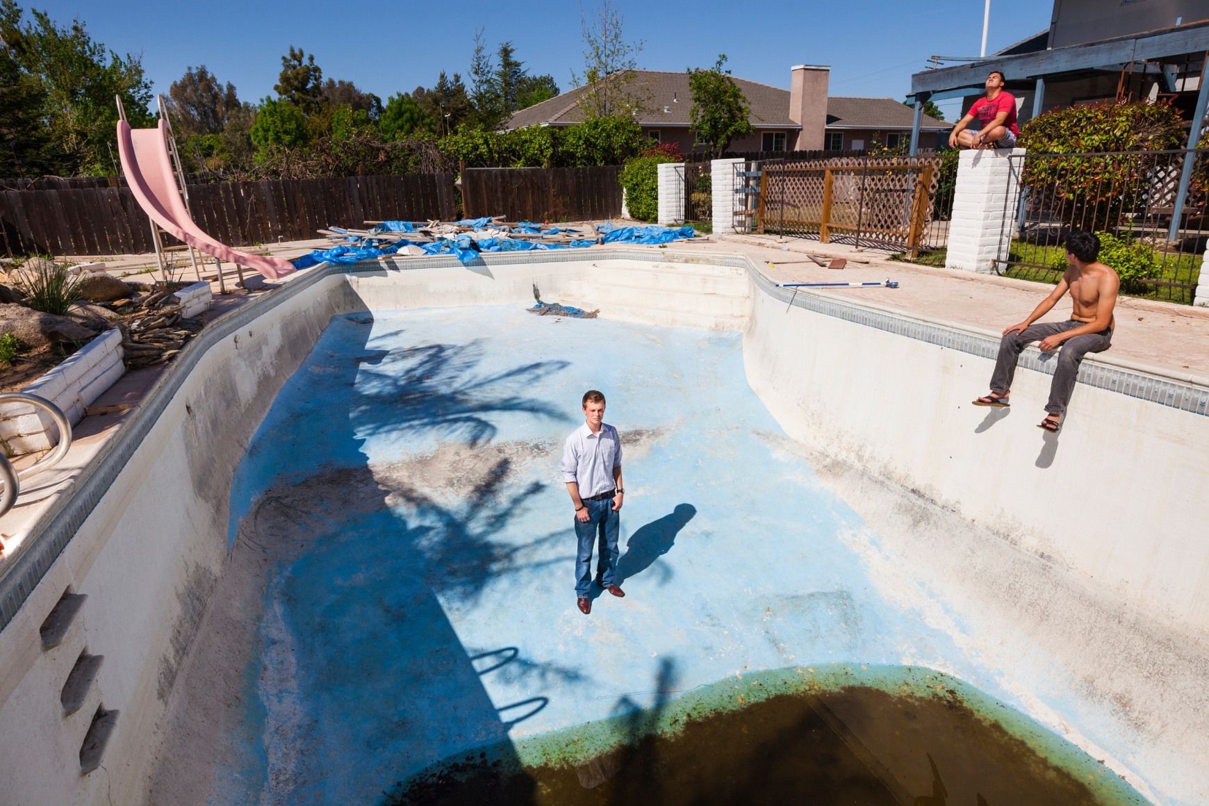University of California Merced students (from left) Jaron, 20, Steven, 19, and Matthew, 19, who traded cramped dorm rooms to share a foreclosed mansion, 2012, Archival Pigment Print