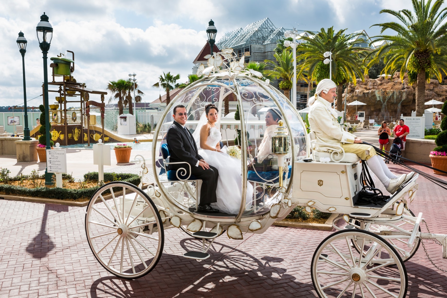 Christina, 21, a Walmart pharmacy technician, en route to her Disney Fairy Tale Wedding in Cinderella’s glass coach, a package extra that includes footmen and miniature white ponies, Walt Disney World, Orlando, Florida, 2013, Archival Pigment Print