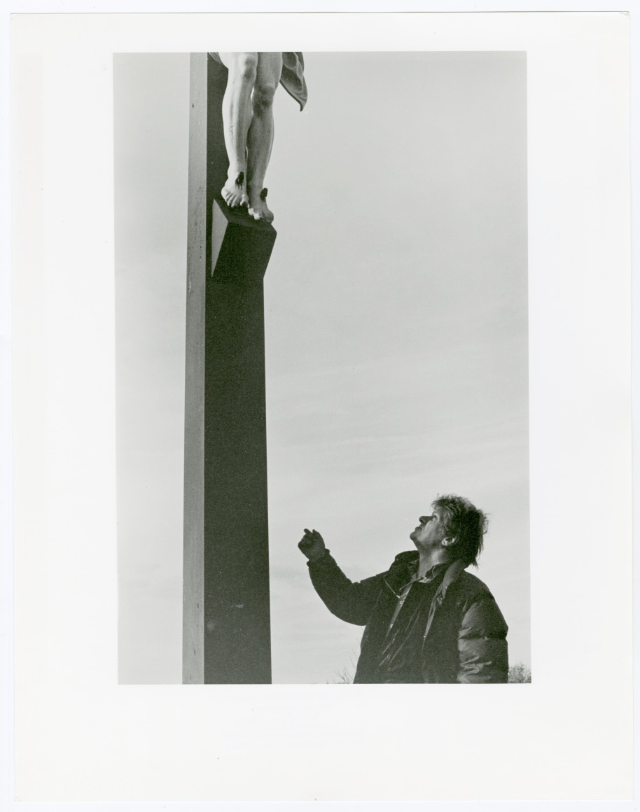 Gregory Corso addressing Cross atop the Grey Nuns' Orphanage Grotto, Lowell Mass, March 17, 1986