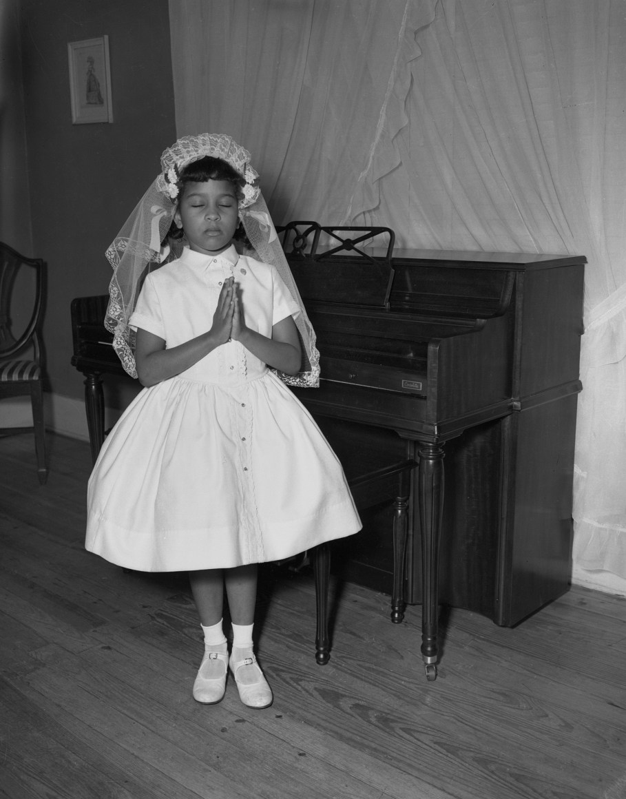 Debra Nell Brittenum in her home late at night in First Communion gown, n.d., Archival Pigment Print