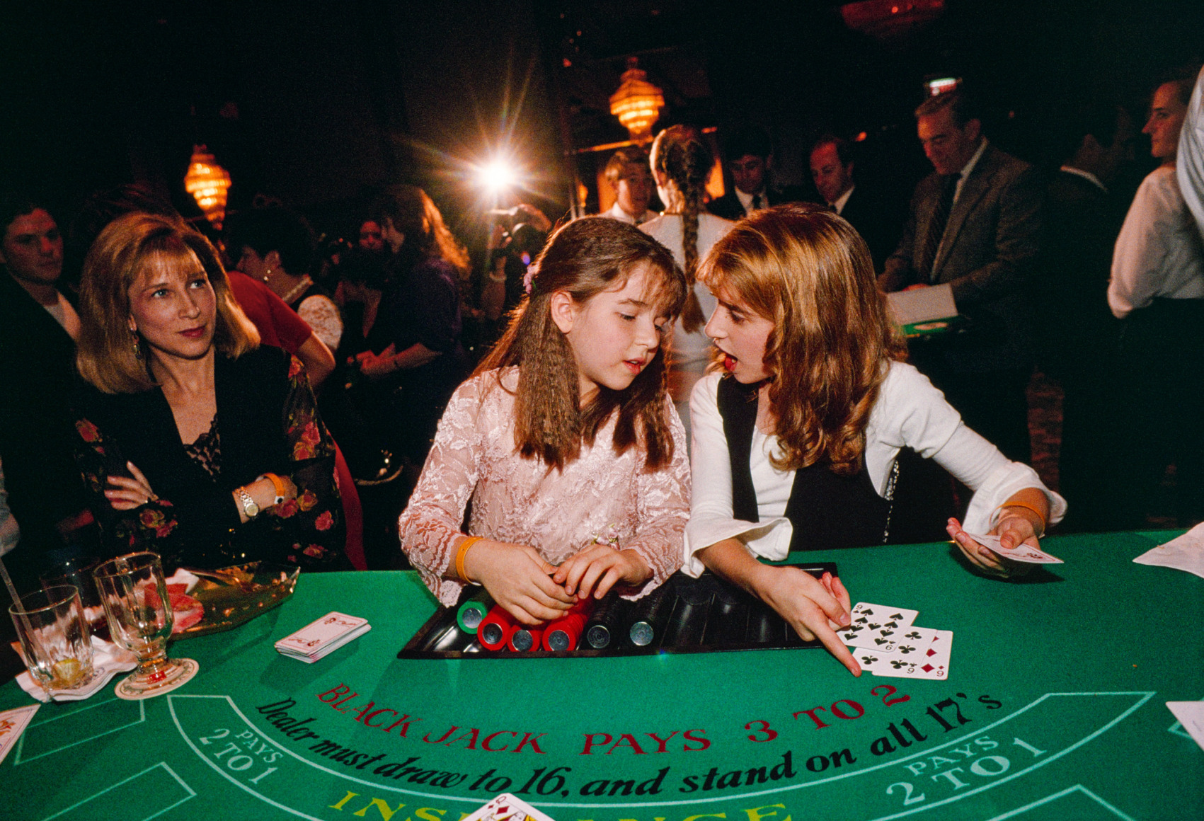 Actresses and sisters Ashley, 9. and Courtney, 12, deal blackjack at a benefit for the American Cancer Society, Universal City. Ashley was the youngest actress ever to be nominated for an Emmy award (at age 6) for her work on the soap opera 'The Guiding Light.' They both work regularly in television and film and have been schooled primarily by set tutors and their mother., Archival Pigment Print