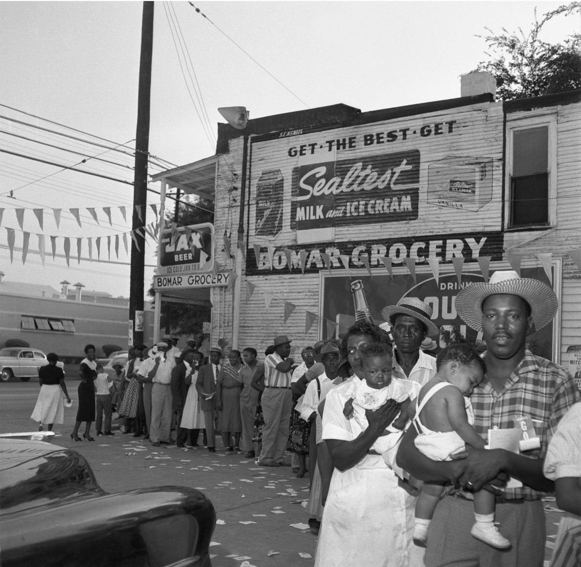 Residents inspired by The Tent City drive, lining up to register to vote, n.d., Archival Pigment Print