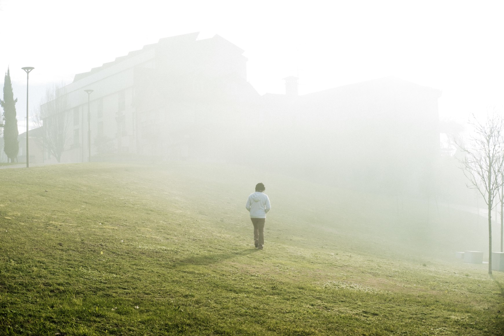 Ana Maria Jeremias disappearing into the smoke of a fire on the morning she arrived in Fafe, just before going to meet her granddaughters after school. Fafe, Portugal, 2024