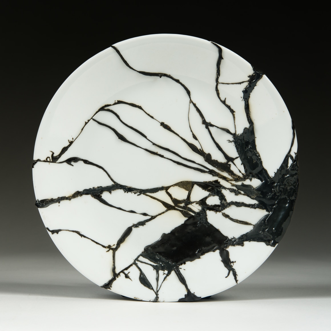 María Elena González (b. 1957)  Plate II, 2022  Vitrelle porcelain, epoxy, aluminum  12 x 10 x 3 3/4 in.