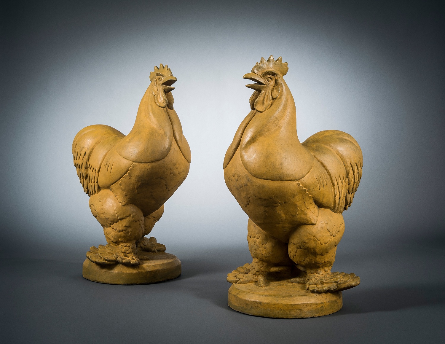 WHEELER WILLIAMS (1897–1972), Pair Gatepost Roosters, 1932. Terra cotta, 34 in. high