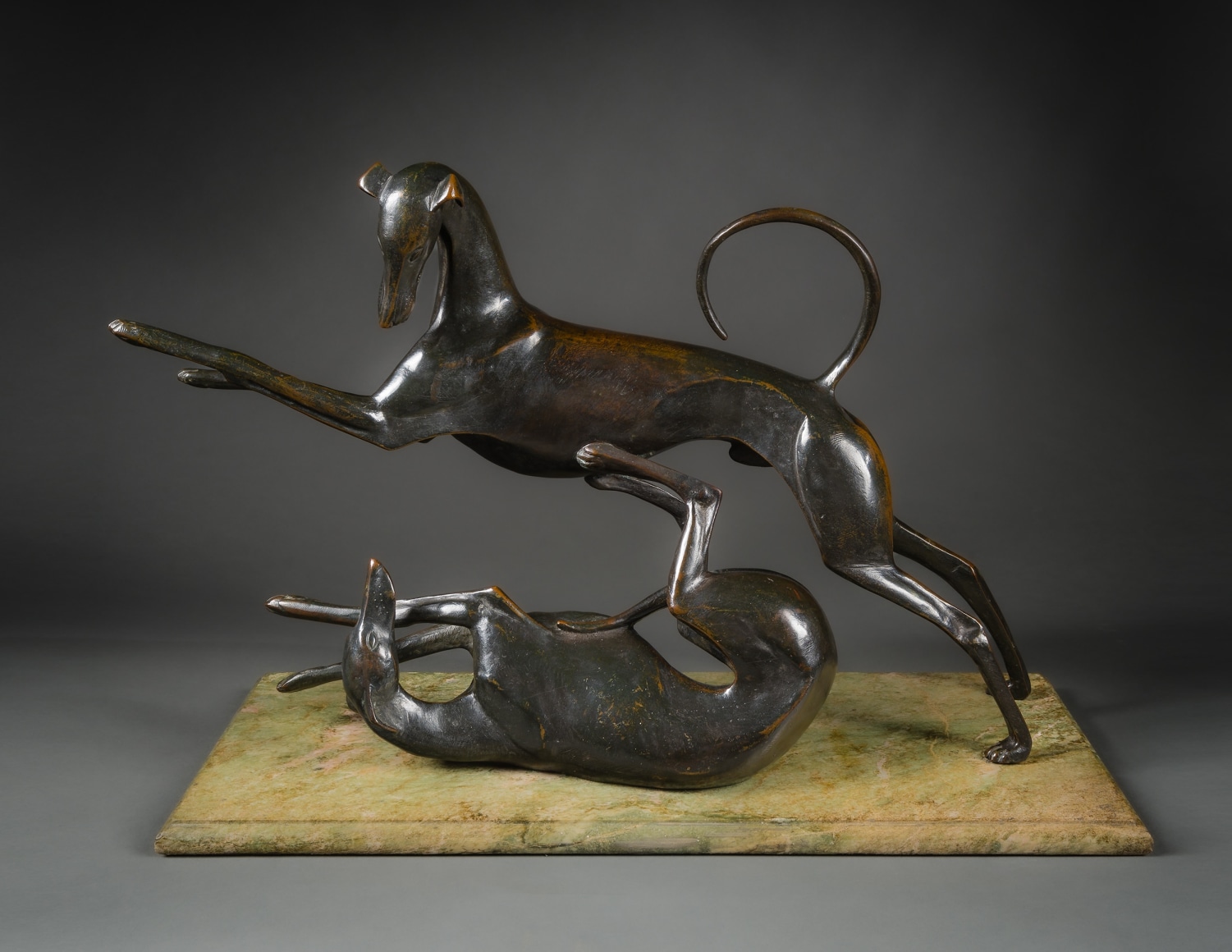 Wilhelm Hunt Diederich (1884&ndash;1953), &quot;Playing Greyhounds,&quot;&nbsp;1913. Bronze on original marble base, 16 3/8 in. high x 25 1/4 in. wide x 9 3/4 in. deep