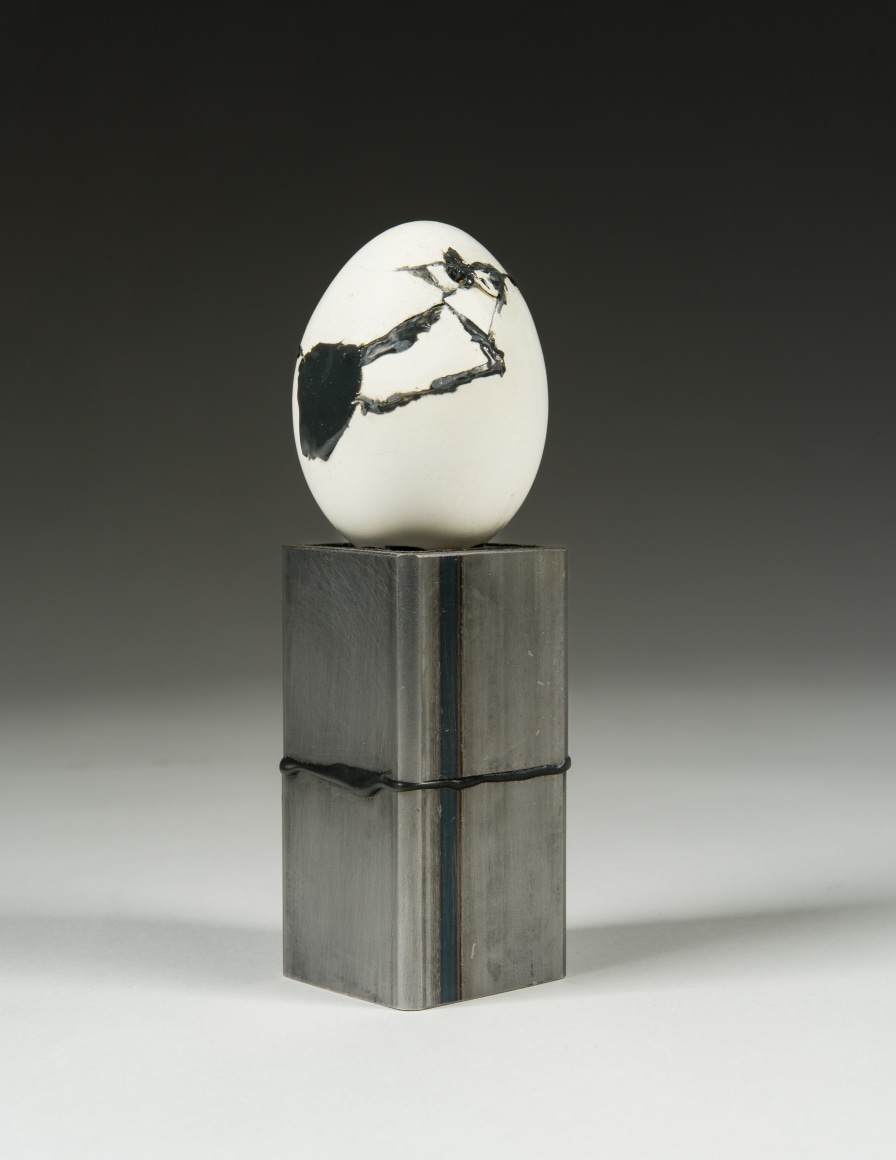 María Elena González (b. 1957)  Egg I, 2020  Egg shell, epoxy, steel, rubber  5 1/2 x 1 3/4 x 1 3/4 in.