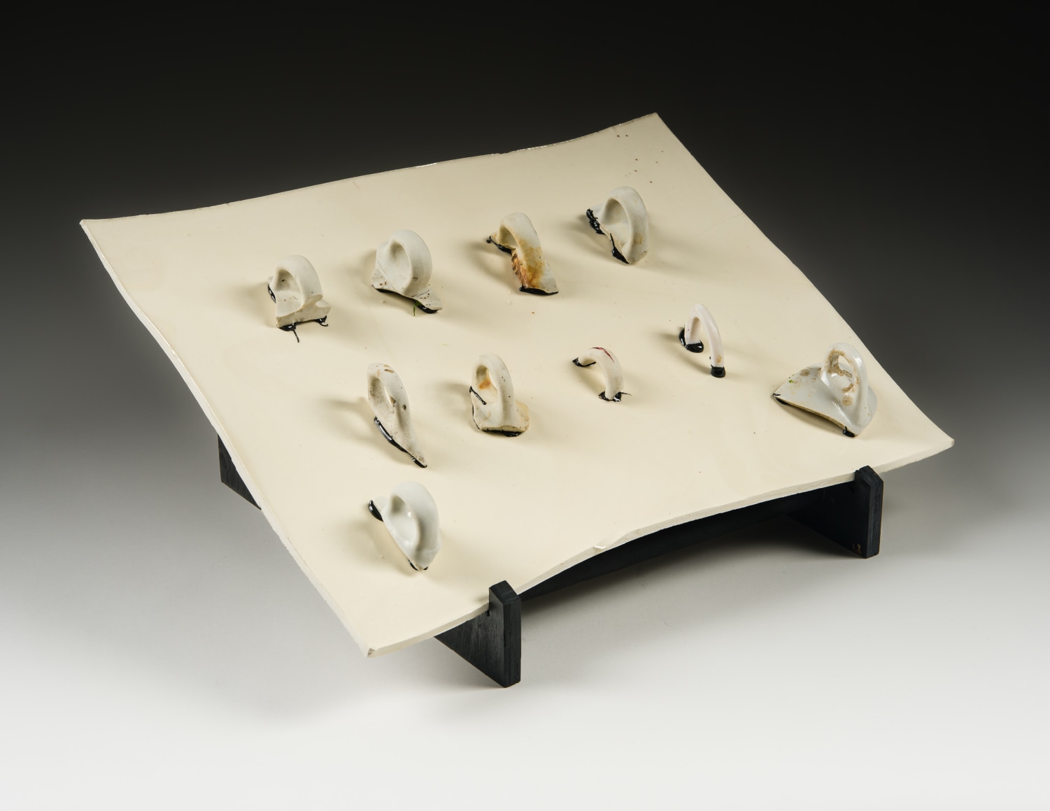 María Elena González (b. 1957)  Tepco II, 2022  Ceramic with glaze, epoxy, wood, latex paint  7 1/2 x 17 1/4 x 13 1/2 in.