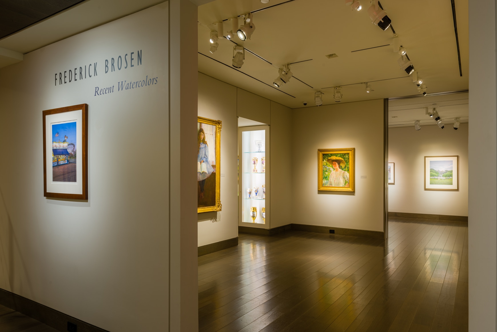 "Frederick Brosen: Recent Watercolors" installation photo; showing gallery entrance with sign and one Coney Island watercolor.