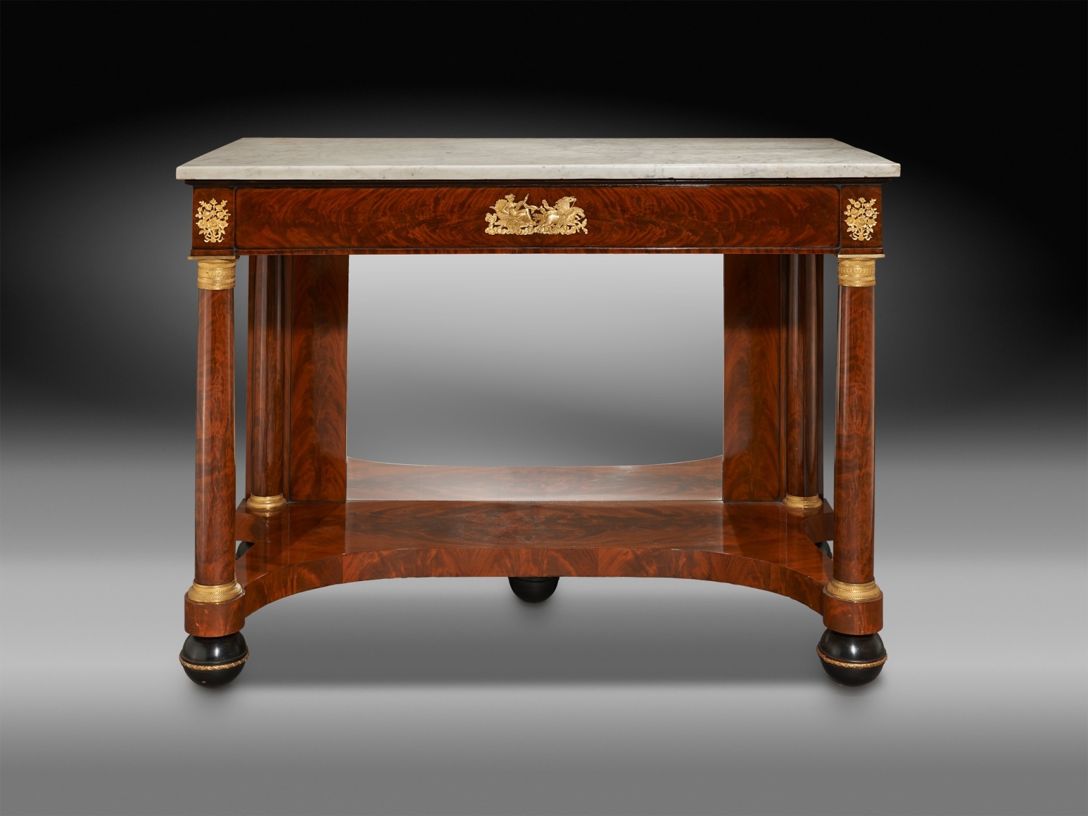 &quot;Monumental Pier Table,&quot; about 1815&ndash;20. Attributed to Vose &amp; Coates, Boston, or Isaac Vose &amp; Son, Boston. Mahogany, partially ebonized, with ormolu mounts, die-rolled gilt-brass moldings filled with lead, marble, and mirror 36 1/2 in. high, 50 1/2 in. wide, 25 3/8 in. deep overall