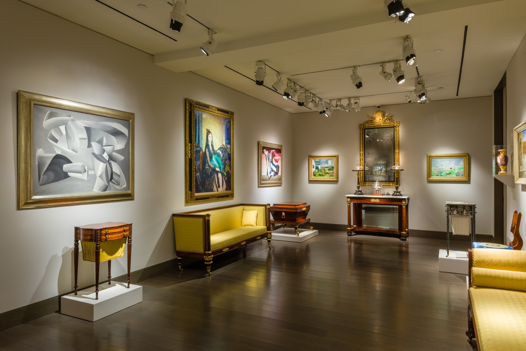 &quot;The Winter Show Live&quot; at Hirschl &amp; Adler. Installation view of paintings, furniture, and decorative arts.