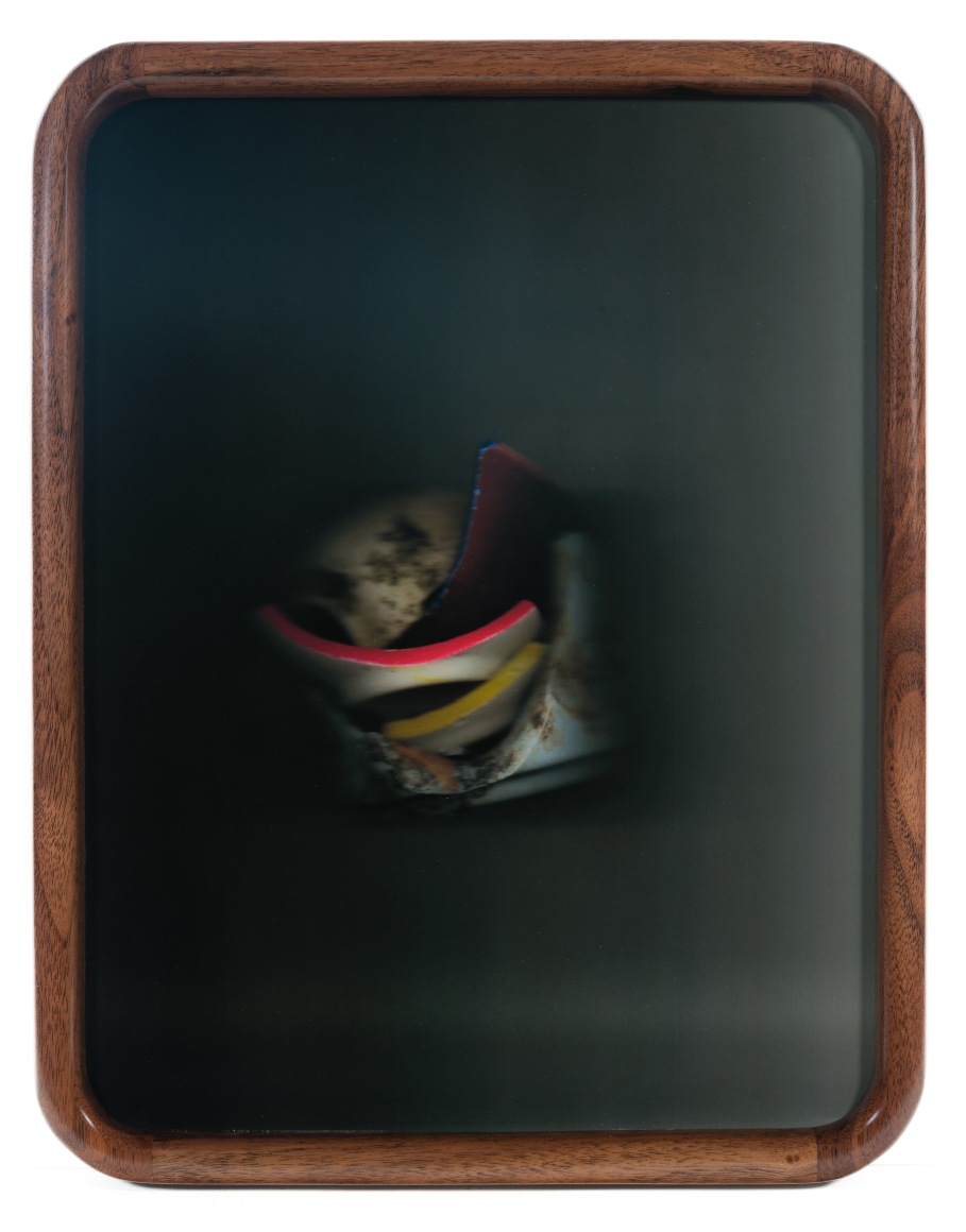 a photograph of broken shards of pottery taken by Maria Elena Gonzalez